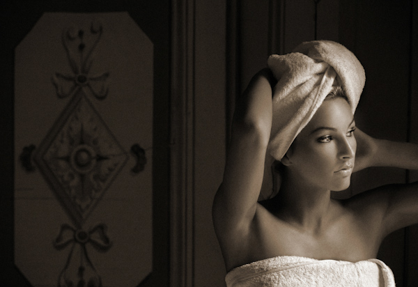 Bride getting ready after a shower - wedding photo by Jerry Ghionis